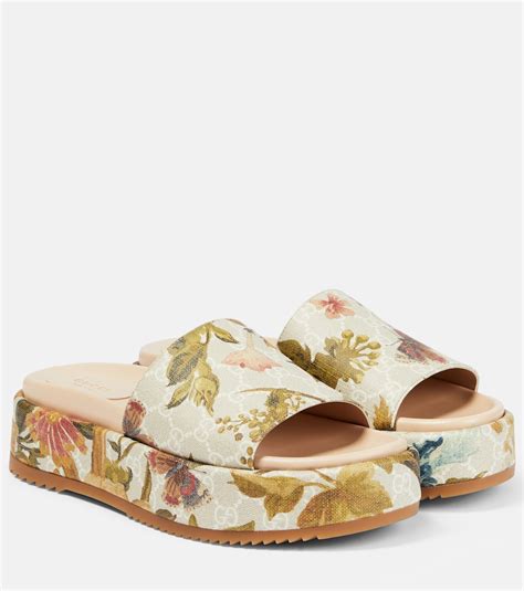 gucci slip ons floral|Gucci floral platform slides.